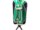 an image of a green and purple vest with a cross on it