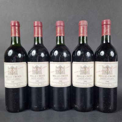six bottles of wine are lined up in a row