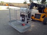 a picture of a forklift with a bucket on top of it