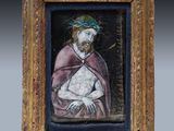 un tableau représentant un homme tenant un bébé dans ses bras, dans un cadre doré