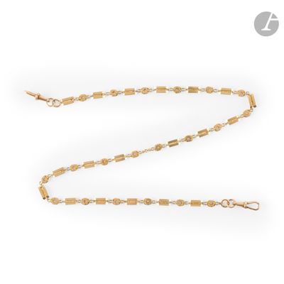 a gold chain with a clasp on a white background