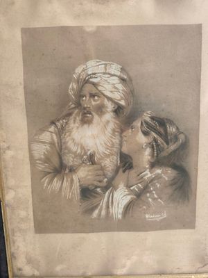 an old picture of a man and a woman in a turban