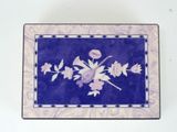 a picture of a blue and white plate with flowers on it
