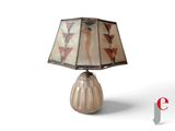 a lamp that has a picture of a woman on it