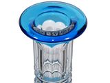 a blue glass candle holder on a white background