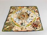 a picture of a table cloth with a picture of a map on it