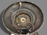 a metal object with wires in the middle of it