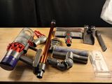 several different types of tools are laid out on a wooden table