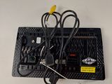 a picture of a computer keyboard with wires attached to it