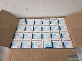 a box full of toothpaste sitting on a table