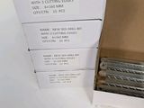 boxed box of four different types of cutting tools on a white surface