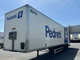 a semi truck that is parked in a parking lot