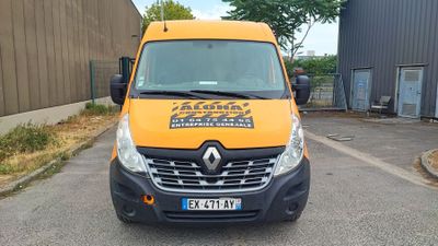 a yellow van parked in front of a building