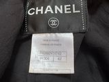 the label on a chanel jacket is clearly visible