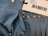 the back of a dress with a label on it that says baksh