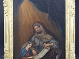 une peinture ancienne représentant une femme tenant un enfant sur ses genoux