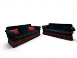 two couches that are sitting next to each other