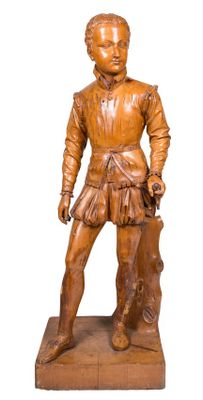 wooden statue of a man holding a dog on a wooden base