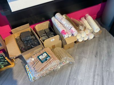 many boxes of food that are sitting on the floor