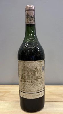 a bottle of wine that is sitting on a table