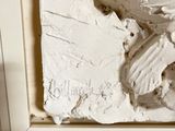 a close up of a clay sculpture of a person