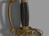 a gold sword with a black handle on a gray background