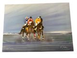 painting of a group of jockeys riding horses on a beach