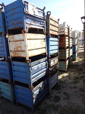 a pile of blue crates stacked on top of each other