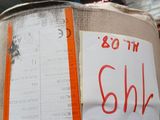a cardboard box with a sticker on it with a price tag attached to it