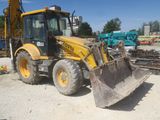 an image of a construction vehicle parked in a lot