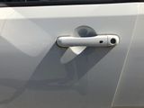 a close up of a door handle on a car