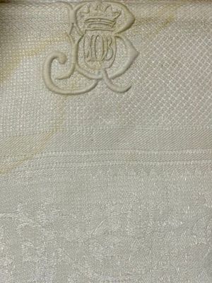 a close up of a piece of cloth with a crown on it