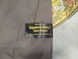 a close up of a tie with a label on it