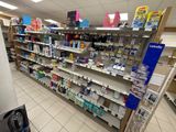 a lot of items on the shelves in the store