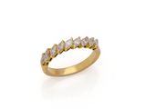 a yellow gold ring with five white diamonds