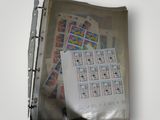 a binder with a lot of stamps on it