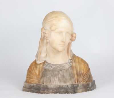 marble bust of a woman wearing a brown dress and a brown jacket