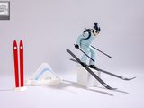 a toy skier that is jumping over a ramp
