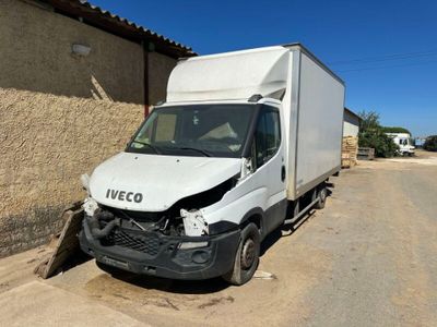 a white truck that is sitting on the side of the road