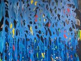 abstract painting of blue, yellow, and red paint on a black background