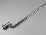 a close up of a metal pipe wren on a white surface