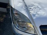 a picture of a car that has been dented and dented