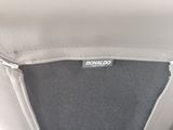 a close up of the inside of a white purse