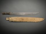 an image of a knife and a knife sheath on a table