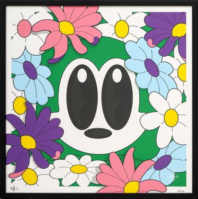 une photo encadrée représentant un personnage de dessin animé entouré de fleurs