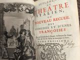 an old book with a picture of a man and a woman on it