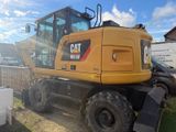 a large yellow construction vehicle parked on the side of the road