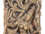 a close up of a sculpture of a woman with a bird in her hand