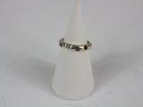 a close up of a white cone with a ring on top of it