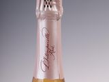 a bottle of wine that is sitting on a table